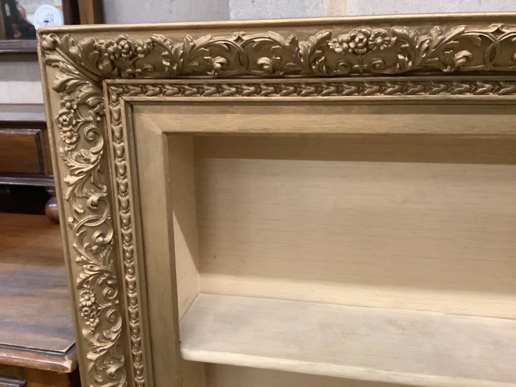 A rectangular gilt picture frame wall bracket, width 80cm height 104cm